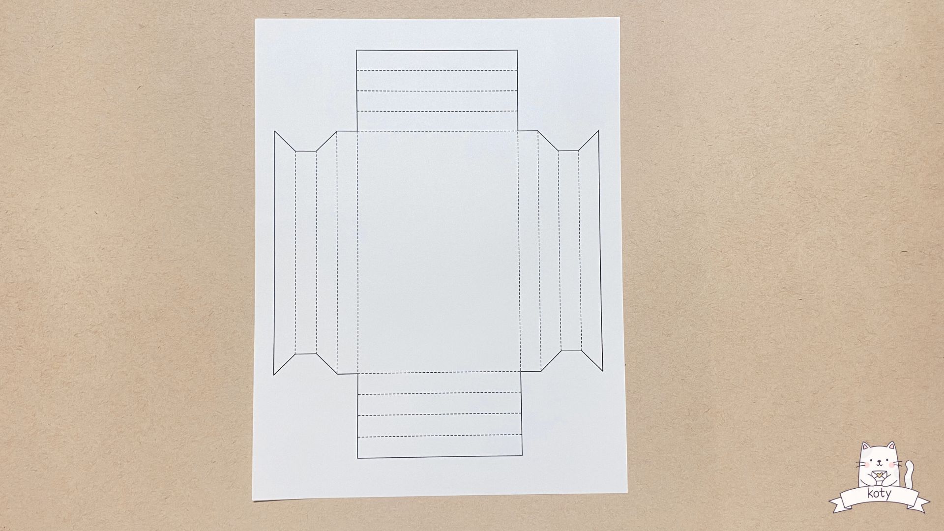 Cutting out the paper frame template